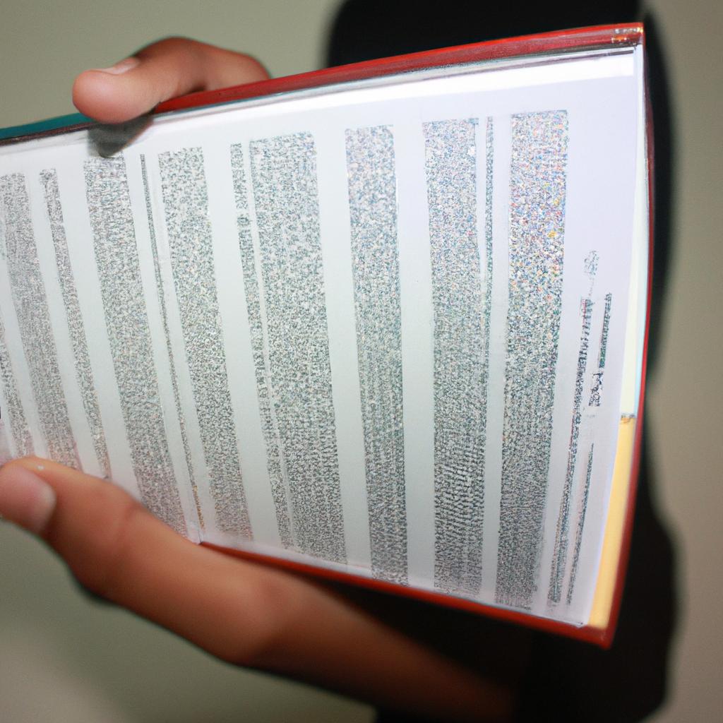 Person holding a reference book